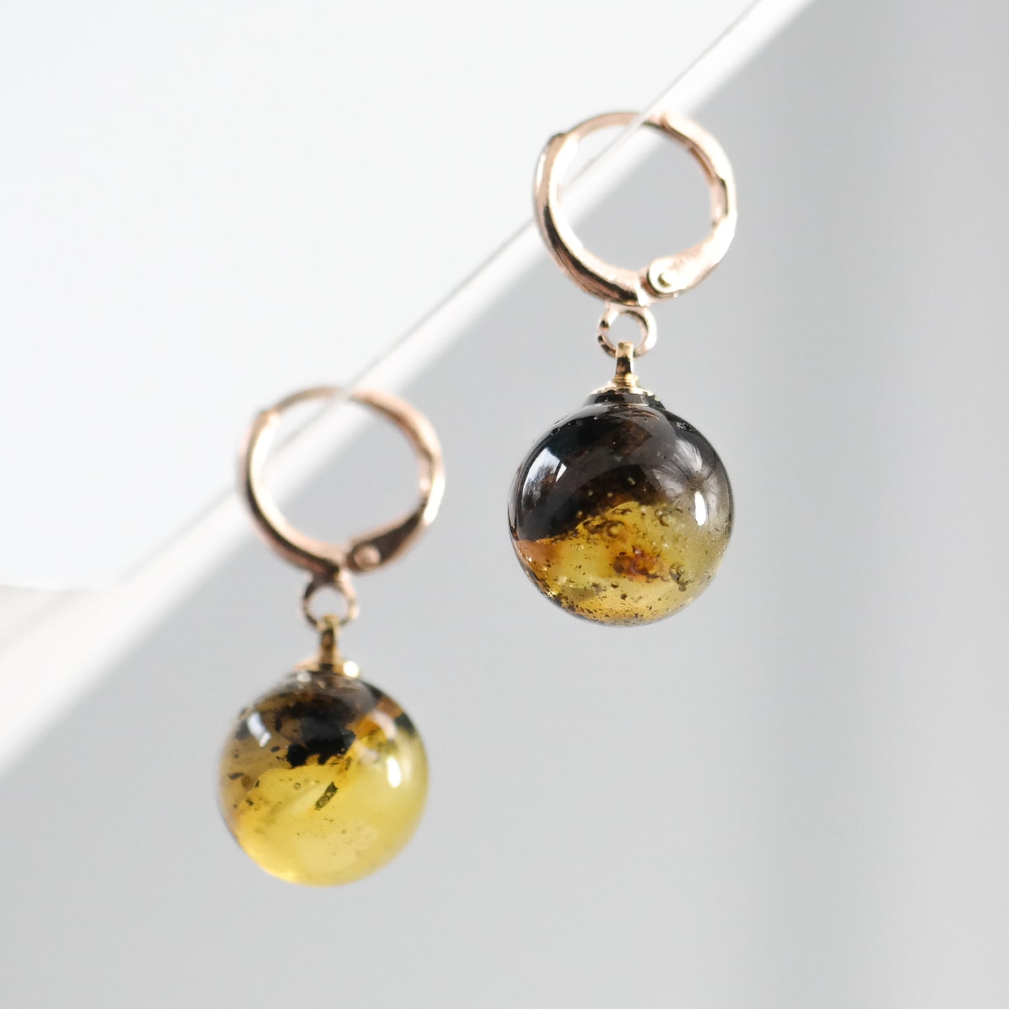 Rose colour dangle women earrings with natural Baltic amber bead