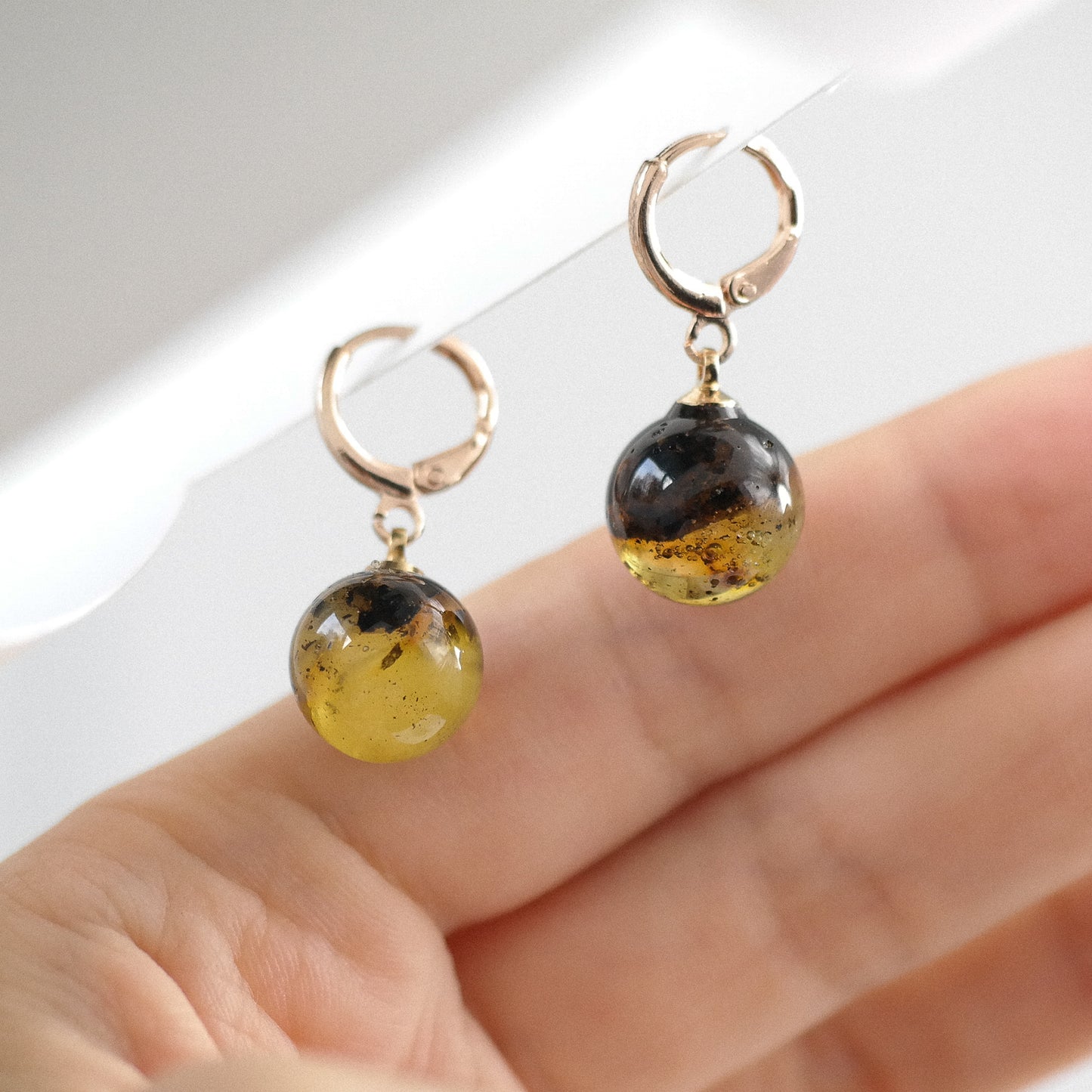 Rose colour dangle women earrings with natural Baltic amber bead