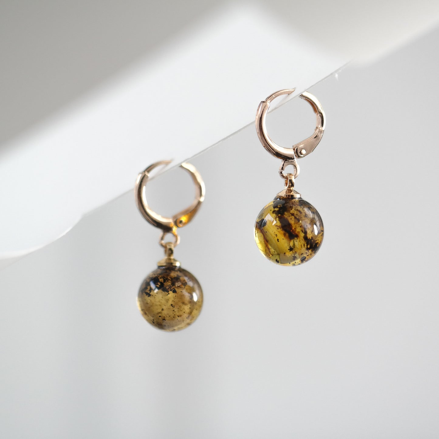 Rose colour dangle women earrings with natural Baltic amber bead