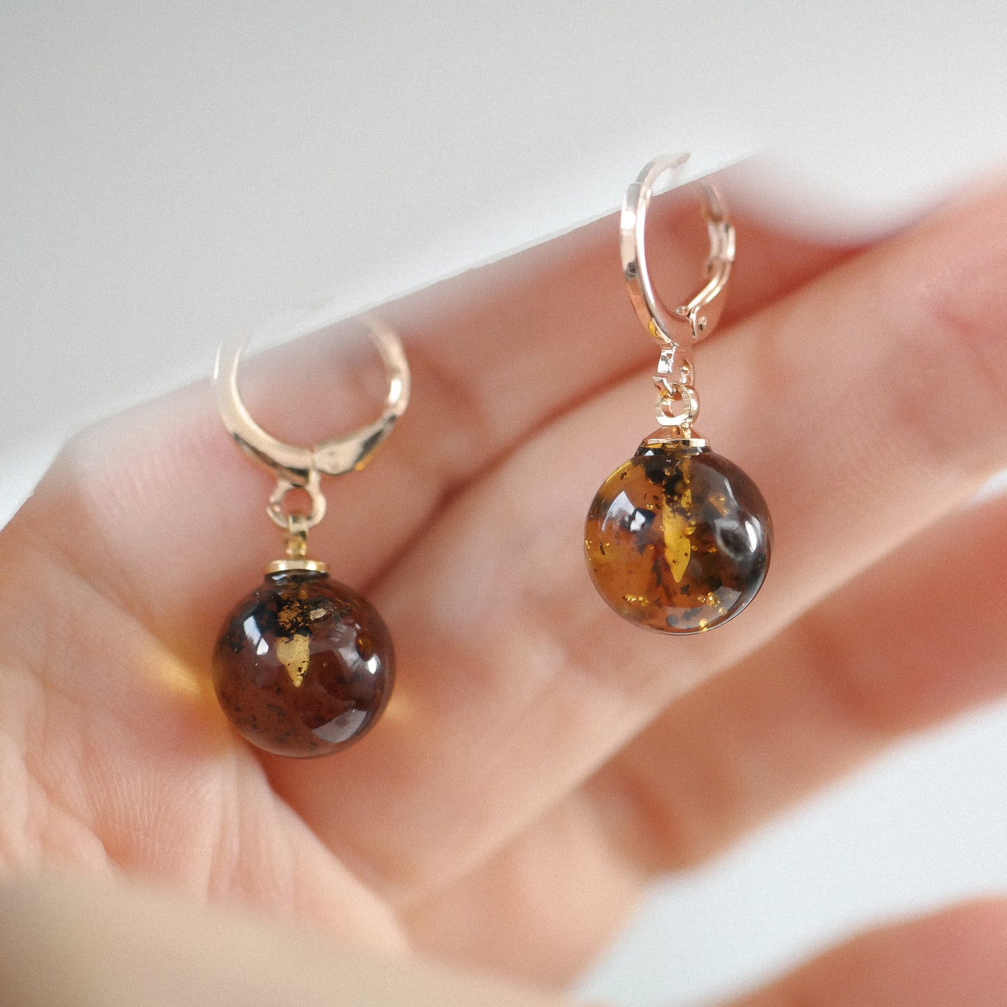 Rose colour dangle women earrings with natural Baltic amber bead