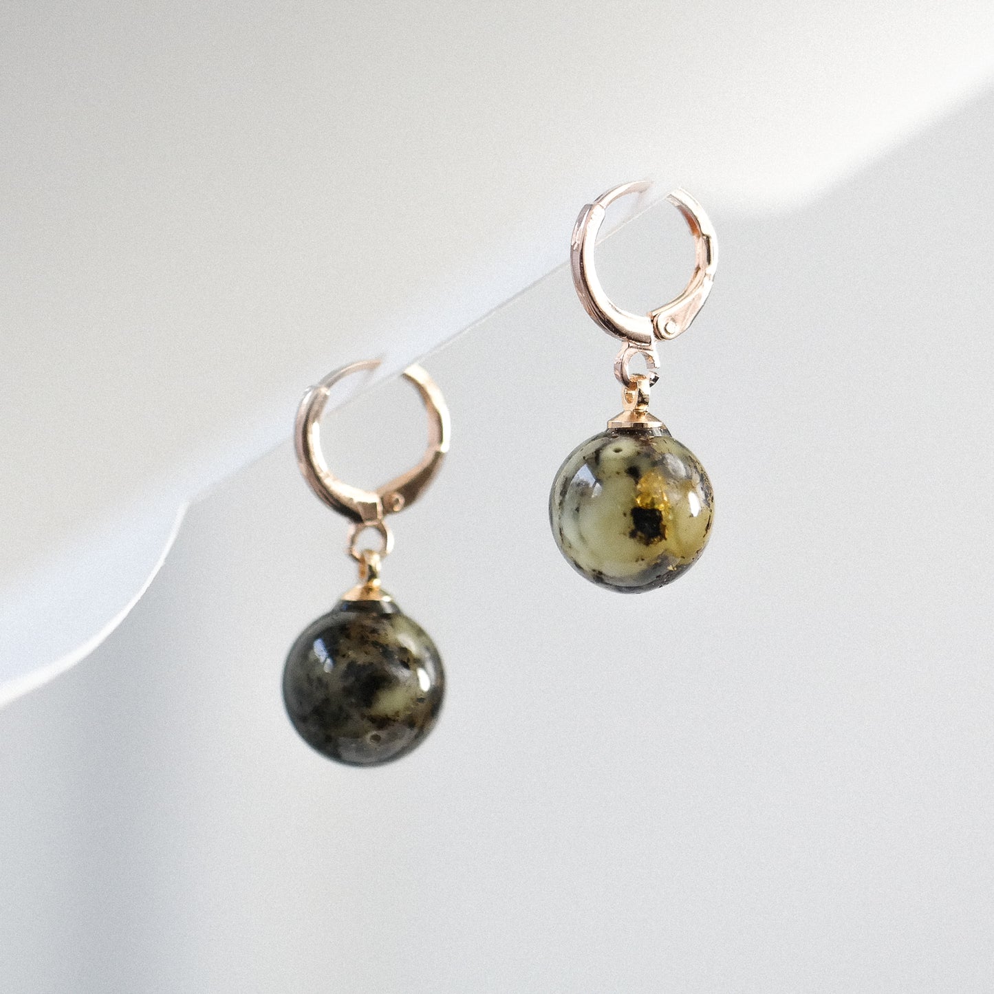 Rose colour dangle women earrings with natural Baltic amber bead