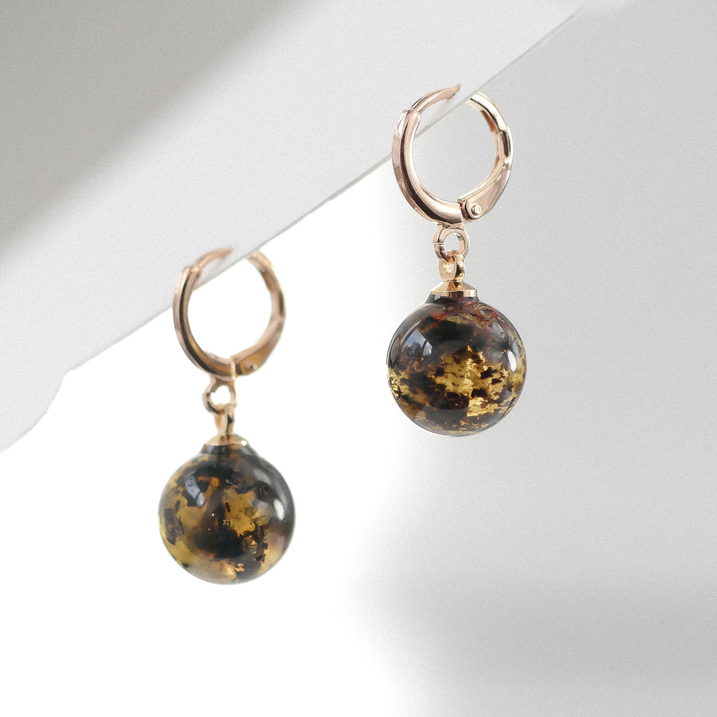 Rose colour dangle women earrings with natural Baltic amber bead