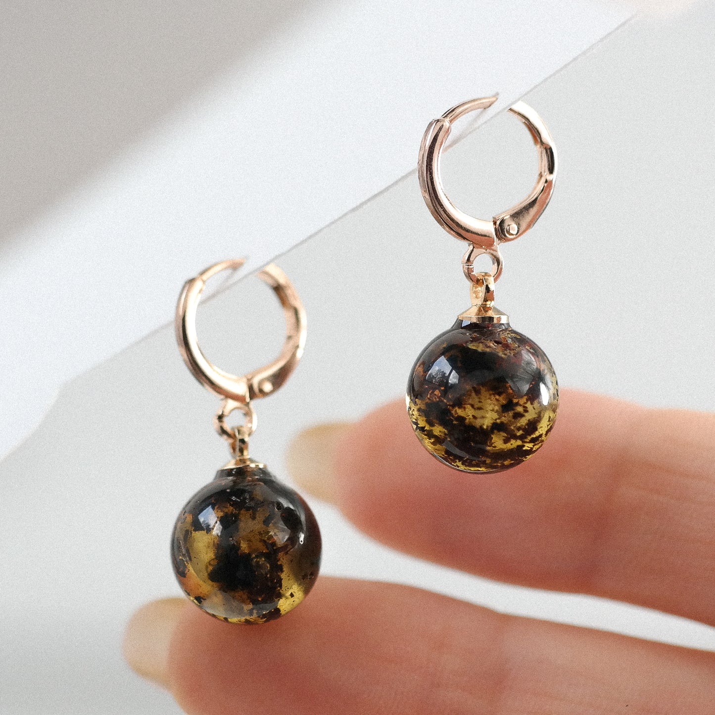 Rose colour dangle women earrings with natural Baltic amber bead