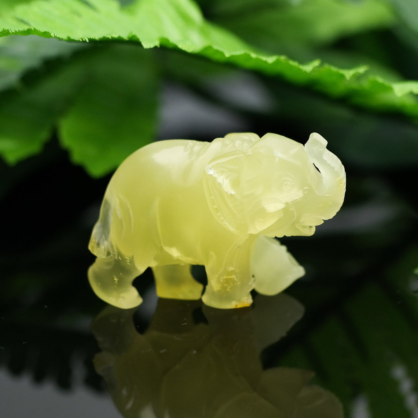 Hand carved elephant figurine from natural Baltic amber