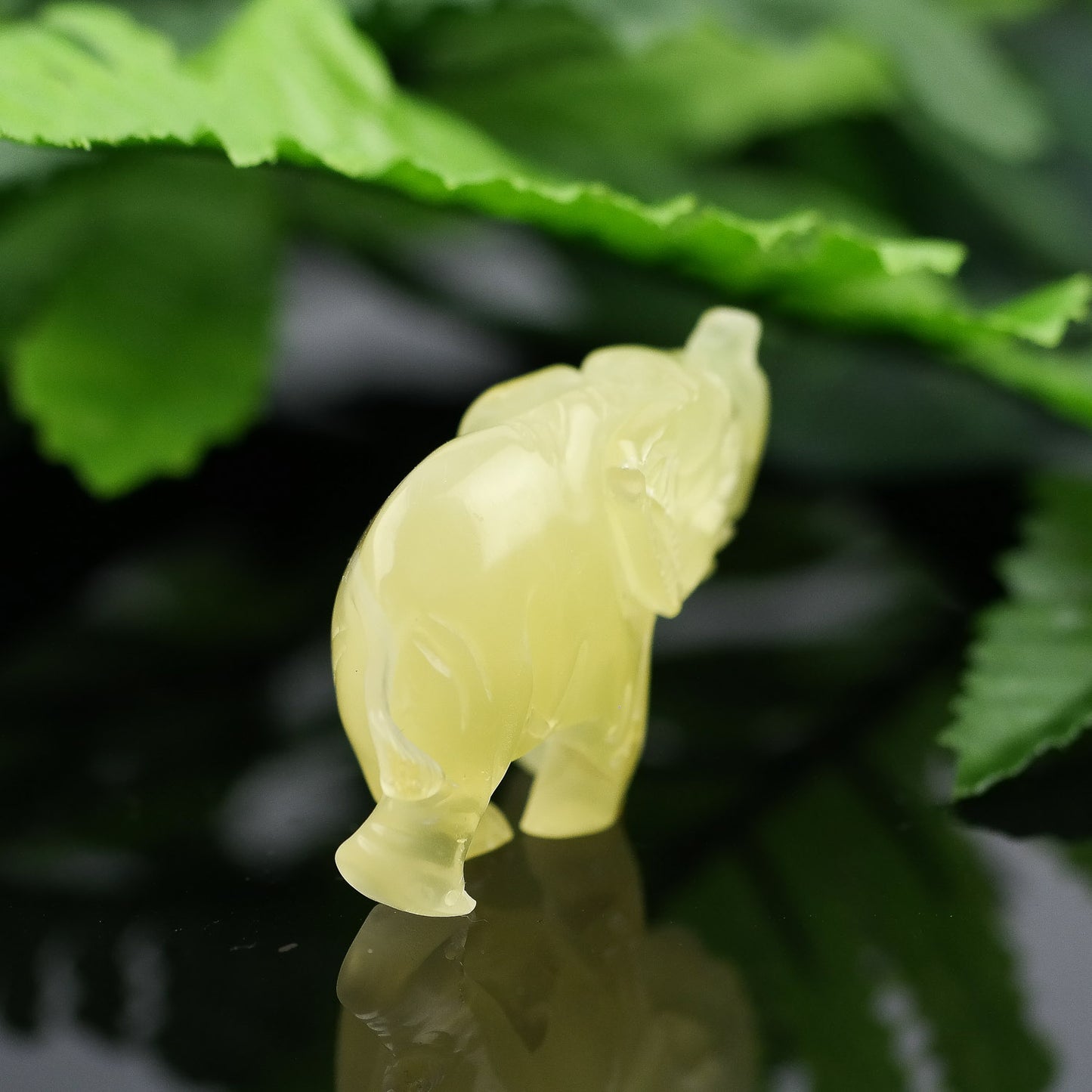 Hand carved elephant figurine from natural Baltic amber