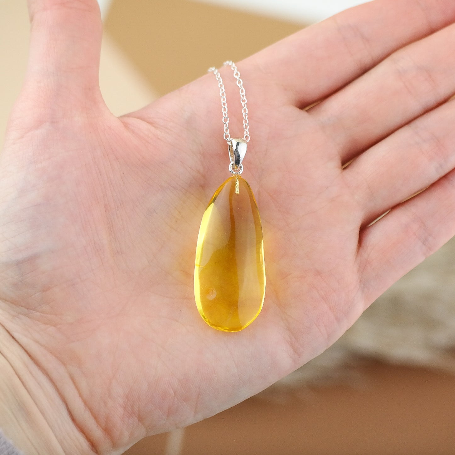 Beautiful lemon colour pendant from natural Baltic amber