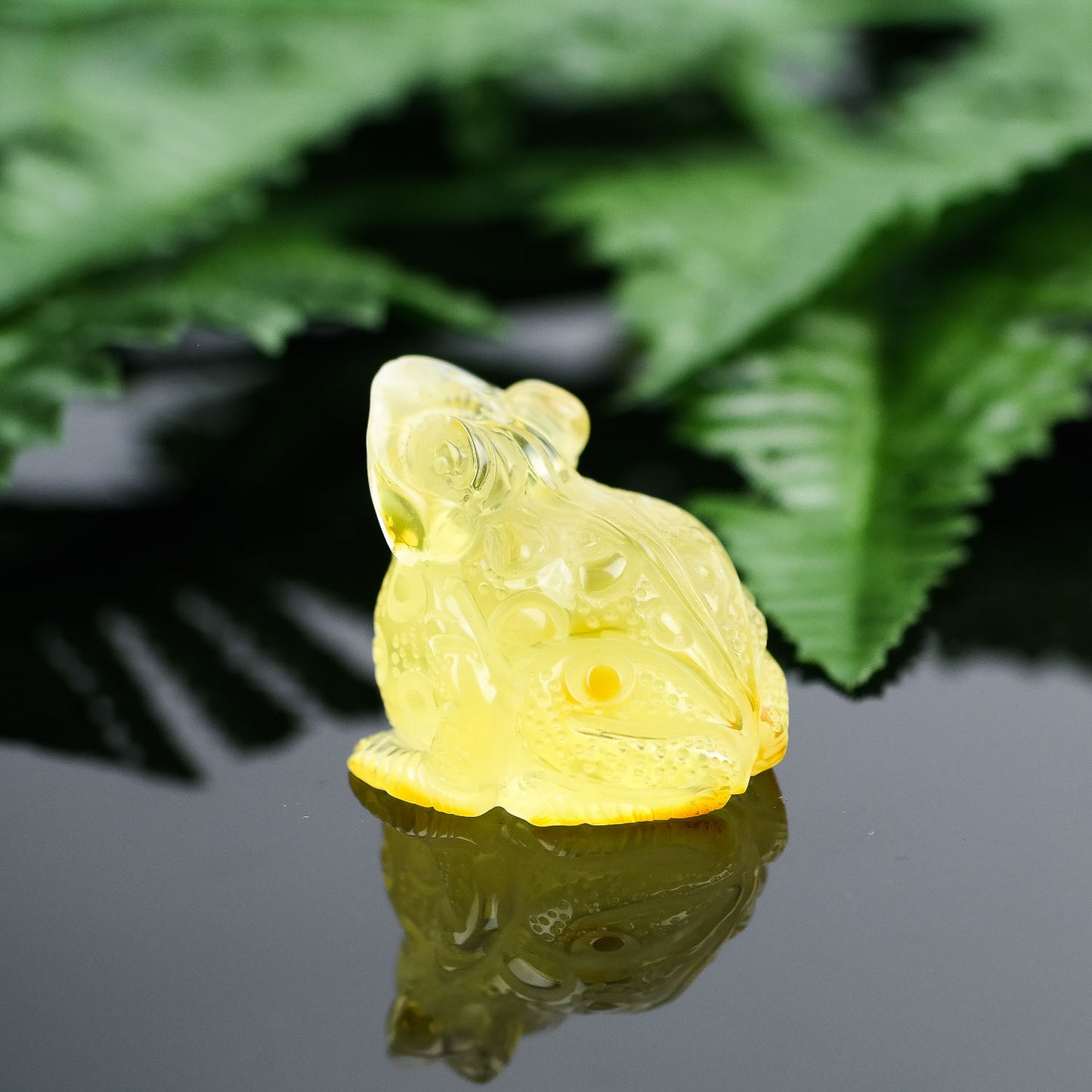 Hand carved natural Baltic amber frogs perfect as a housewarming gift