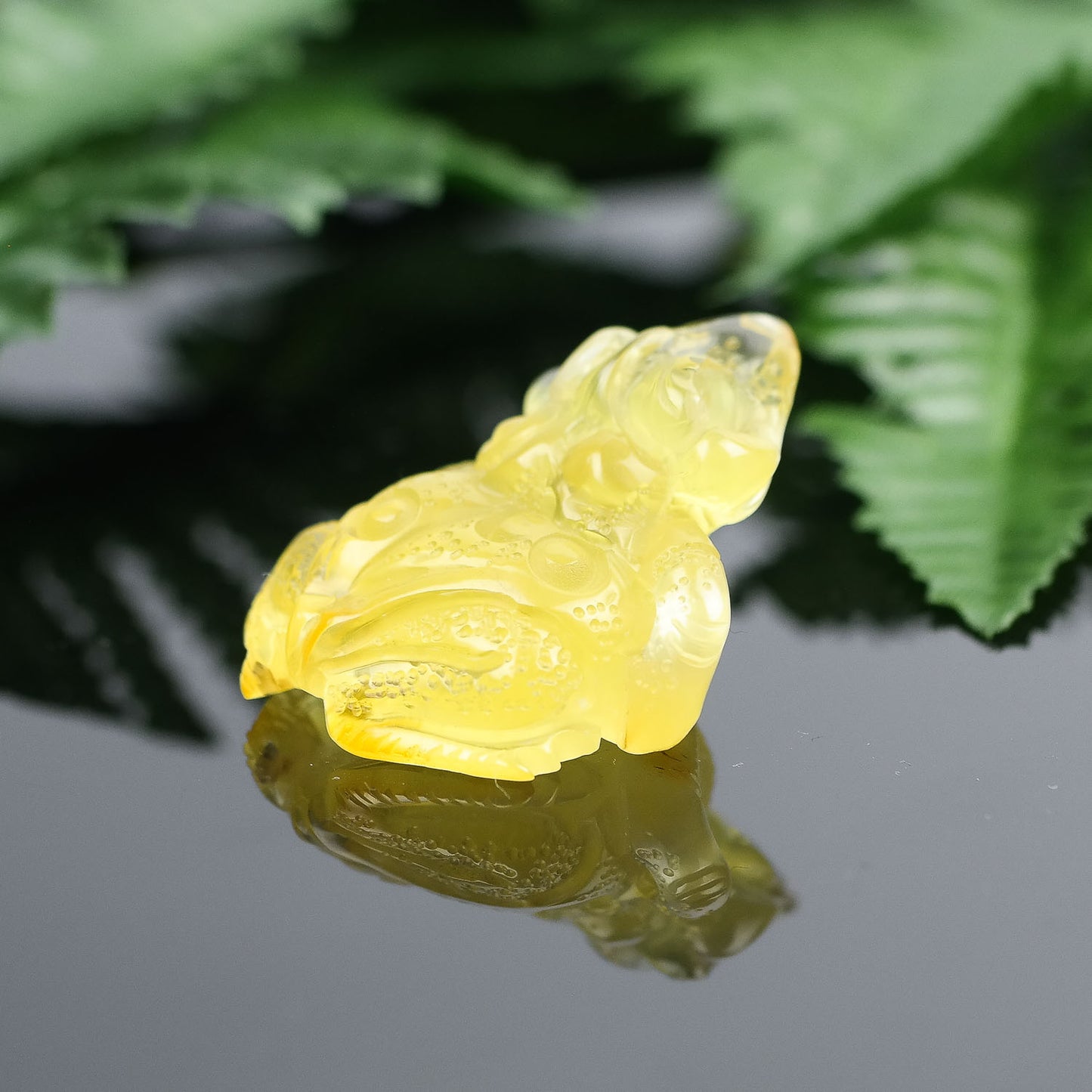 Hand carved natural Baltic amber frogs perfect as a housewarming gift