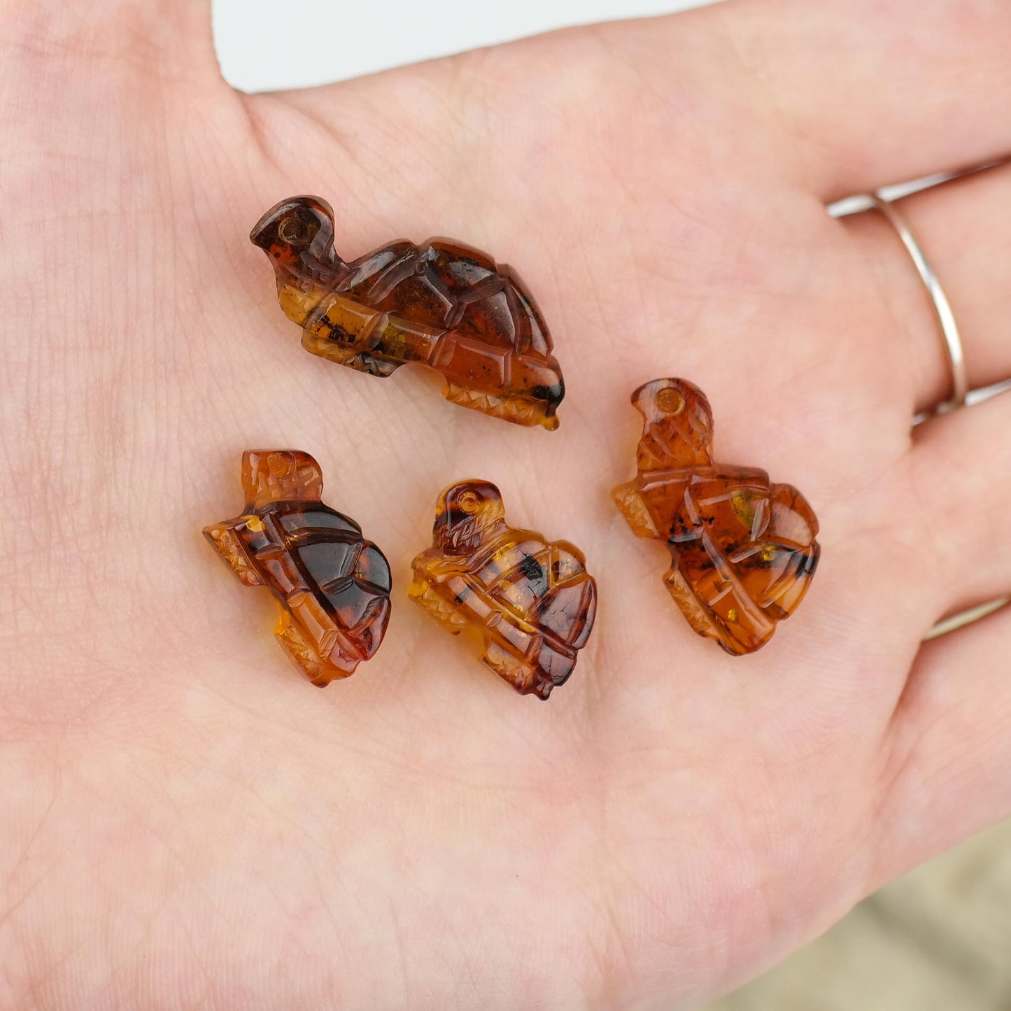 Cute turtle figurines from natural Baltic amber