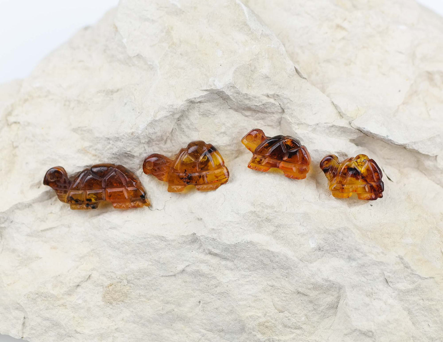 Cute turtle figurines from natural Baltic amber