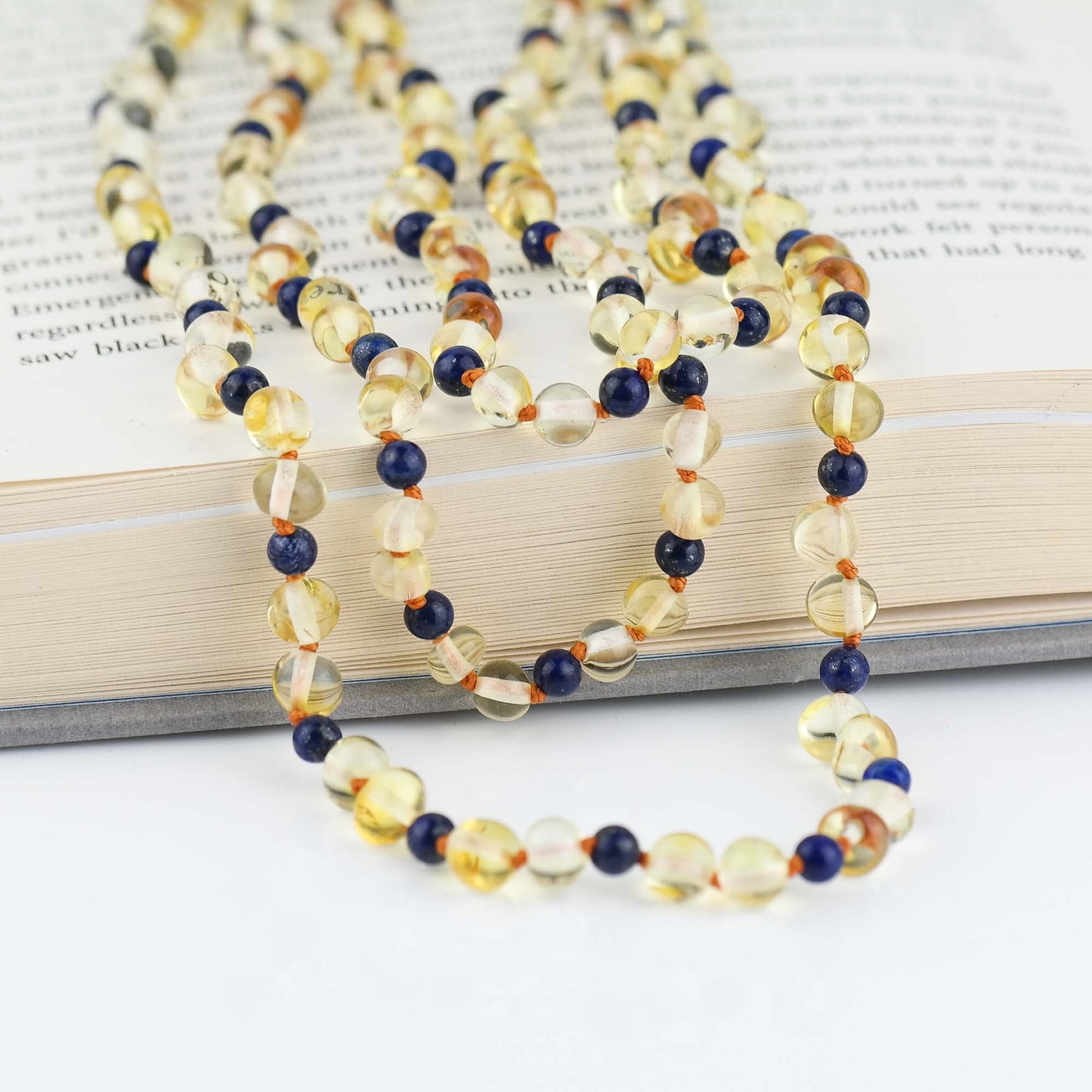 Amber kids necklace with blue amethyst