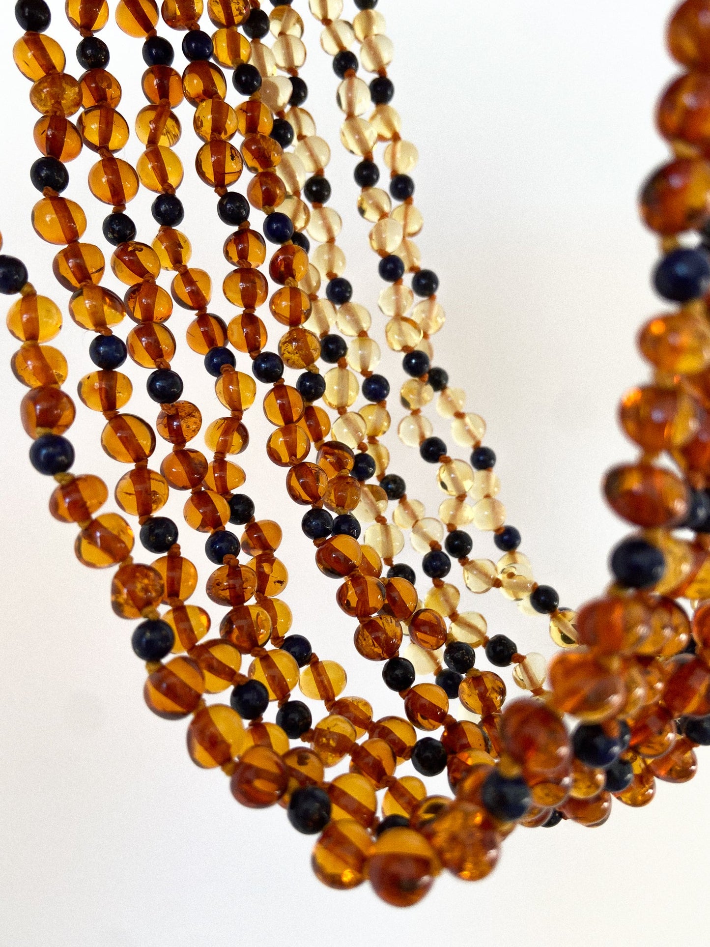 Amber kids necklace with blue amethyst