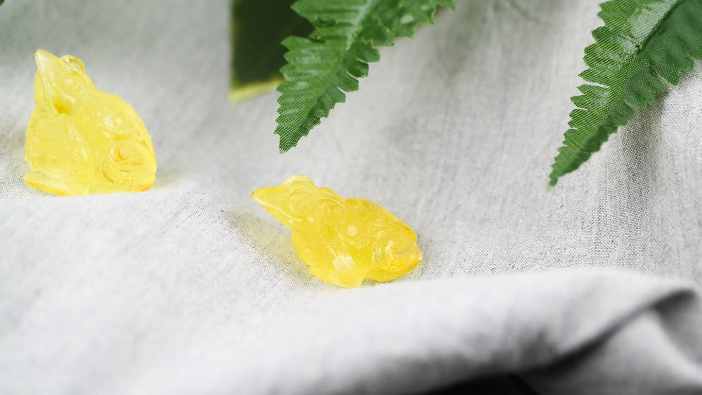 Hand carved natural Baltic amber frogs perfect as a housewarming gift