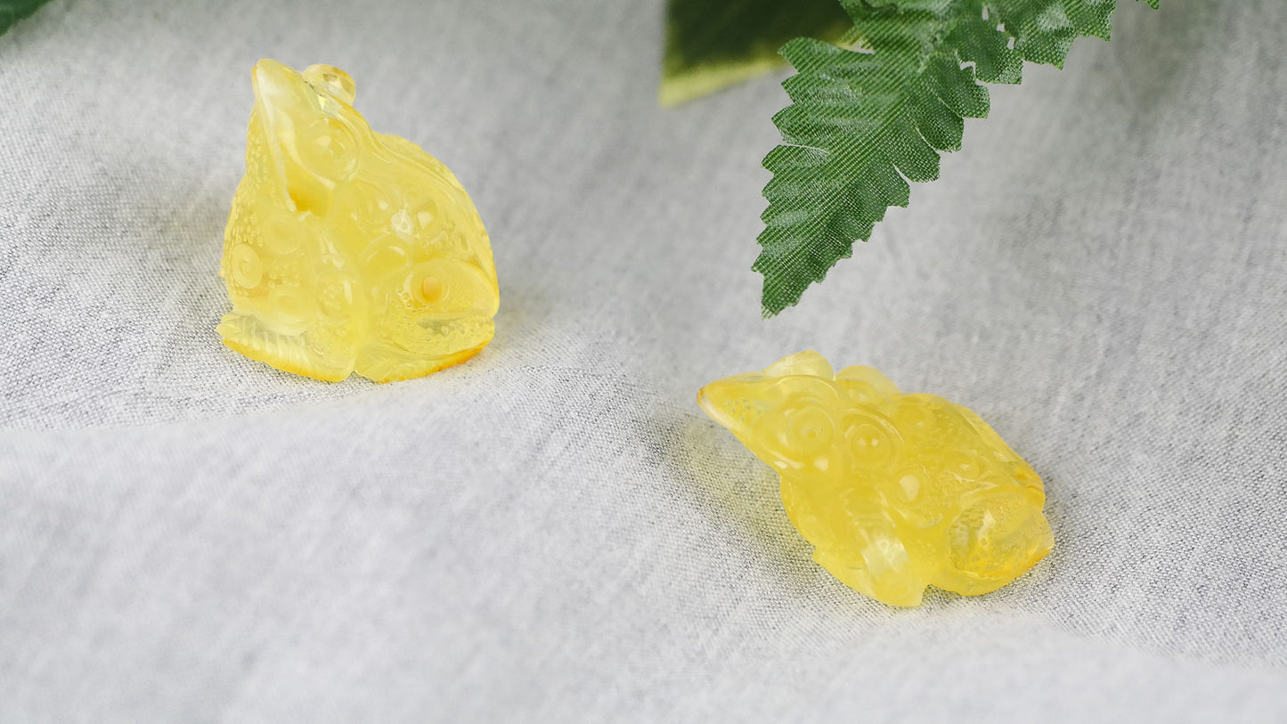 Hand carved natural Baltic amber frogs perfect as a housewarming gift