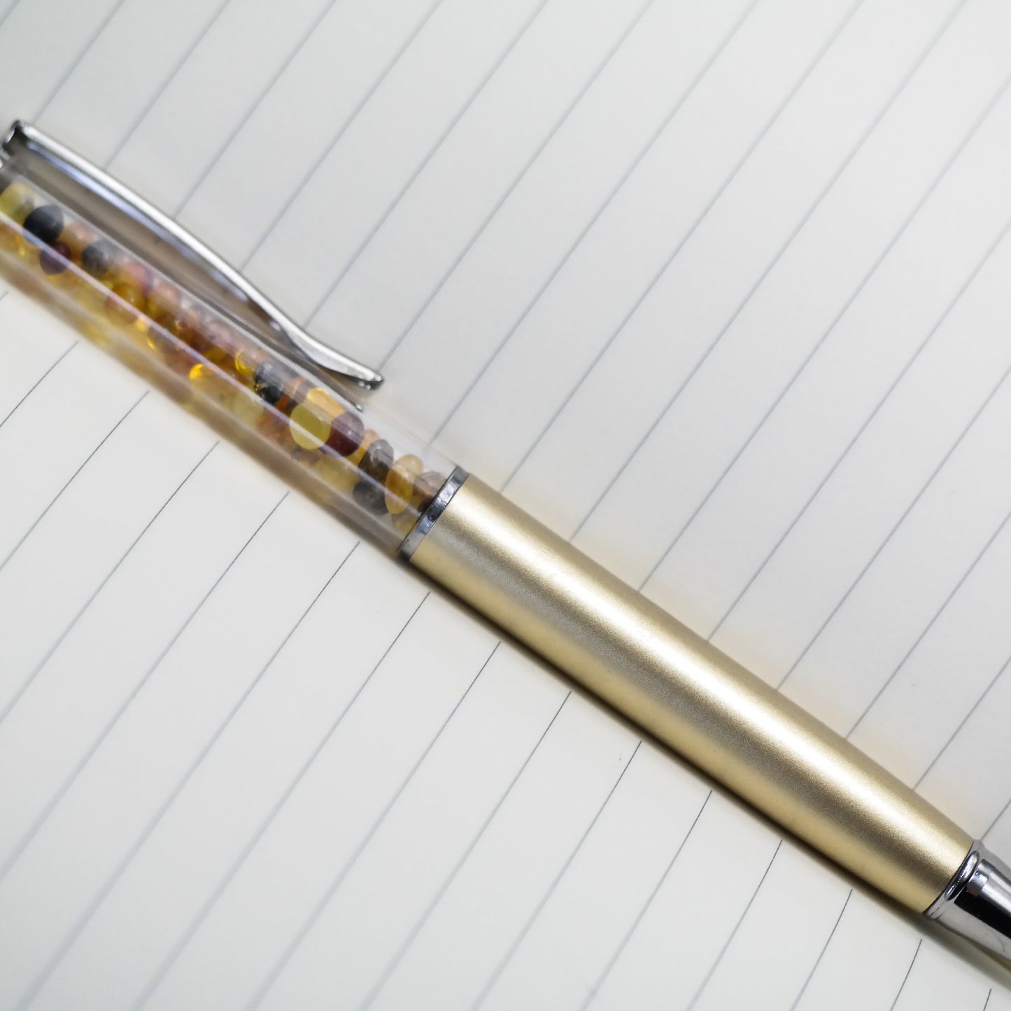 Colourful pen with natural Baltic amber