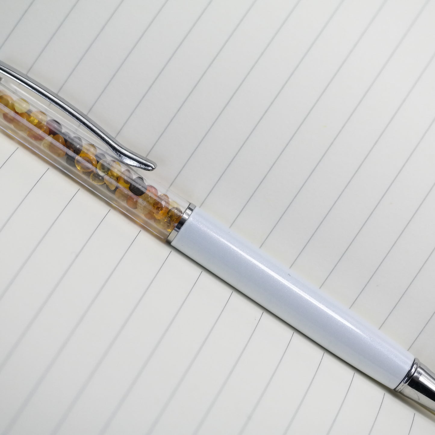 Colourful pen with natural Baltic amber