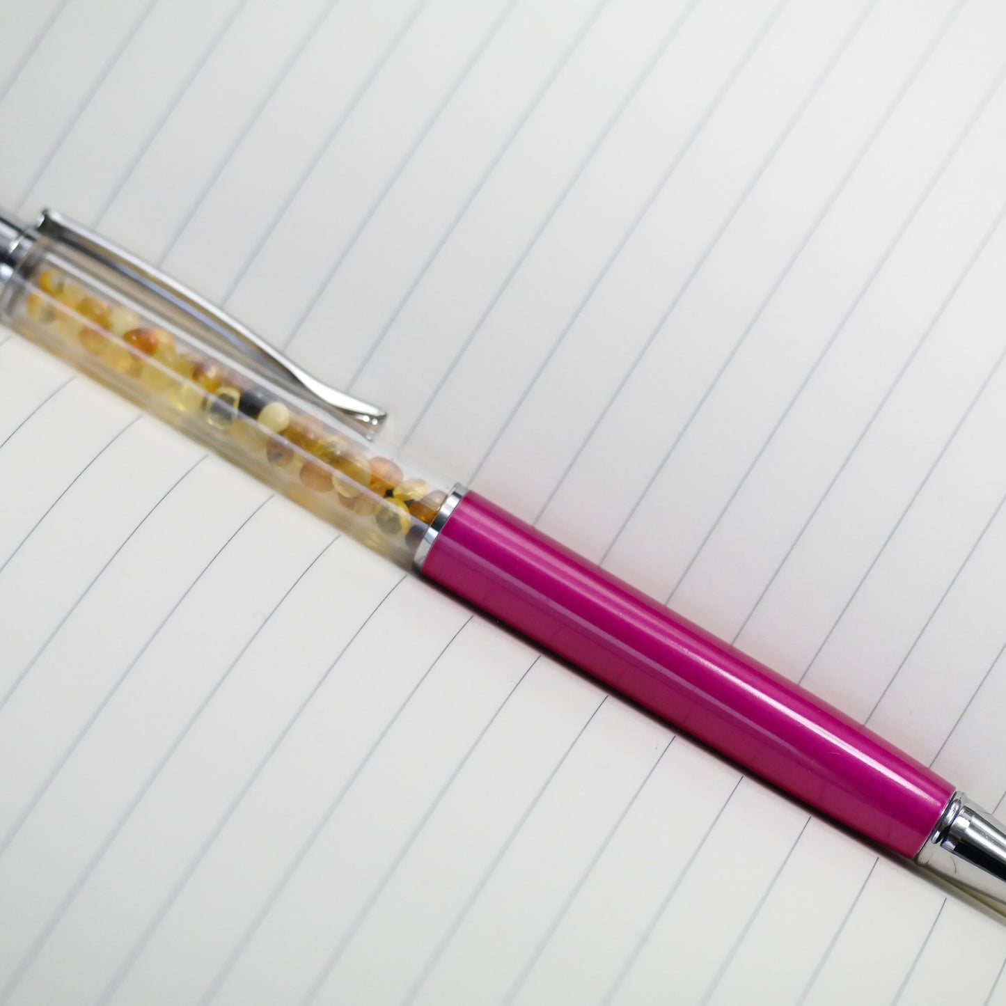 Colourful pen with natural Baltic amber