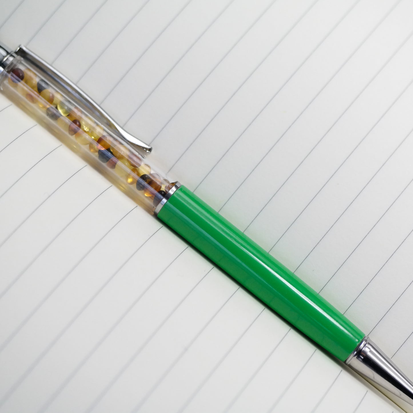 Colourful pen with natural Baltic amber