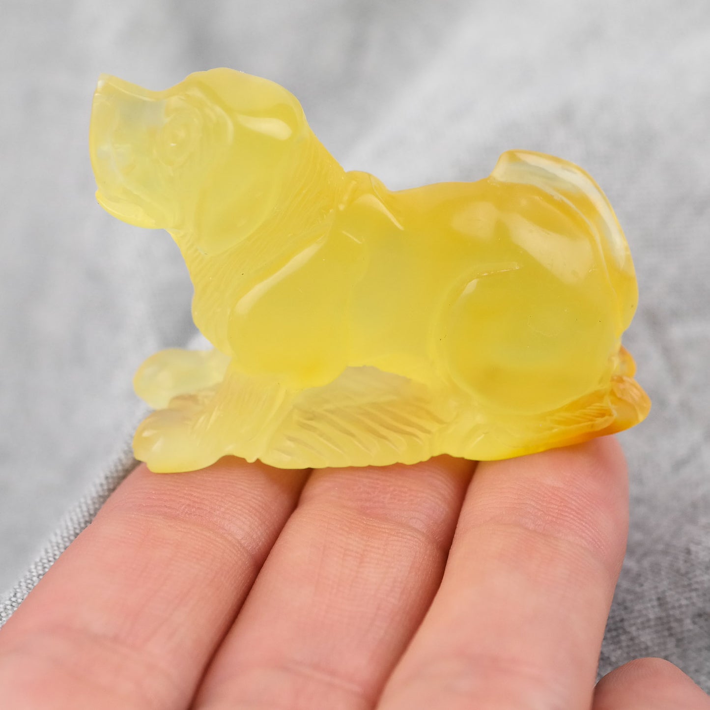 Hand carved Baltic amber figurine for dog owners