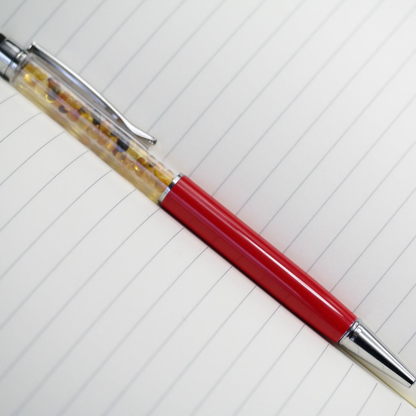 Colourful pen with natural Baltic amber