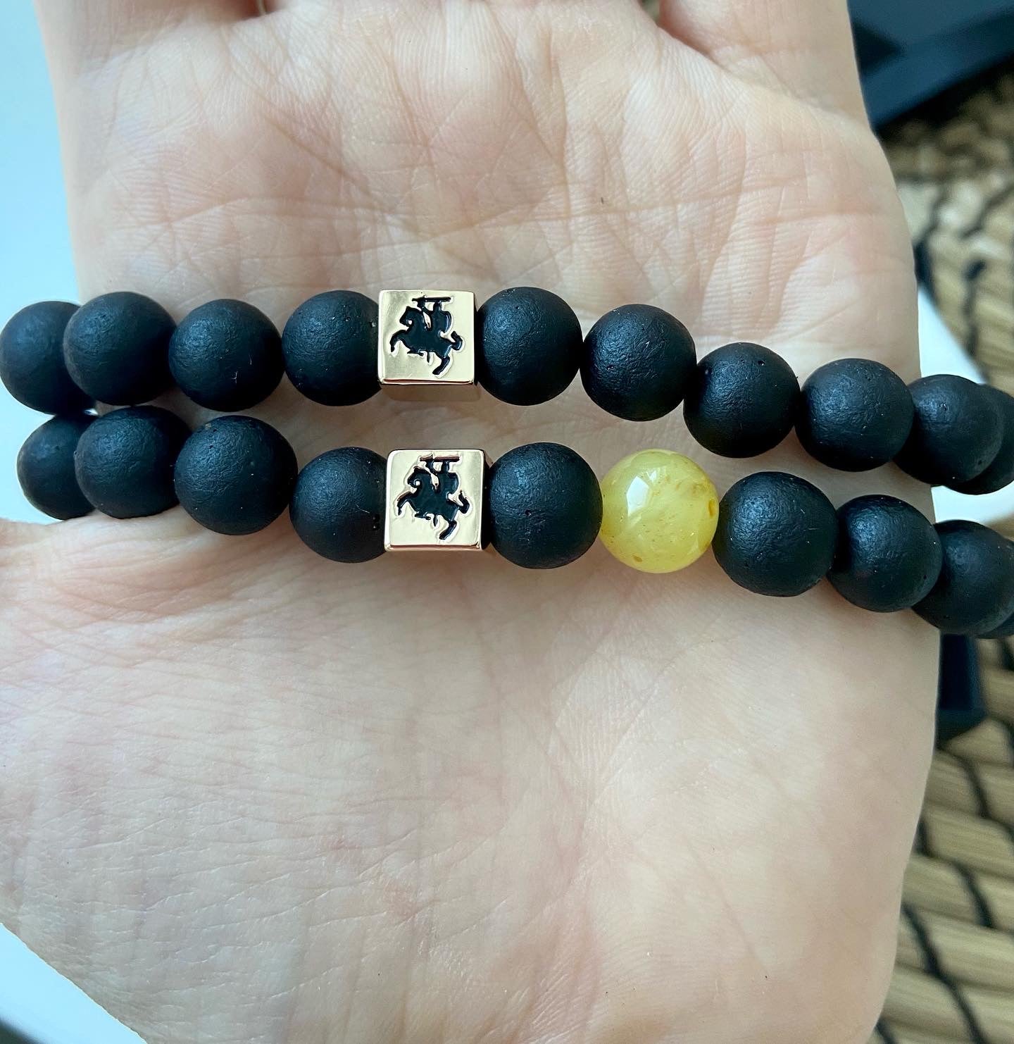 Amber bracelet with handmade brass bead of Vytis