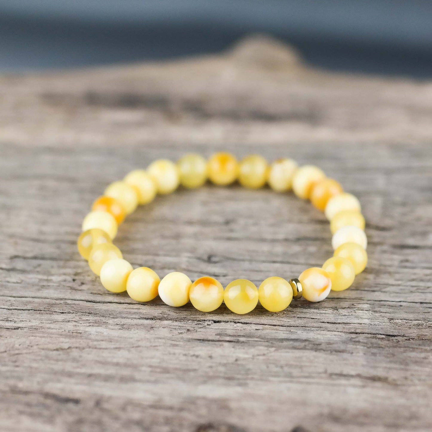 Handmade bracelets from round amber beads