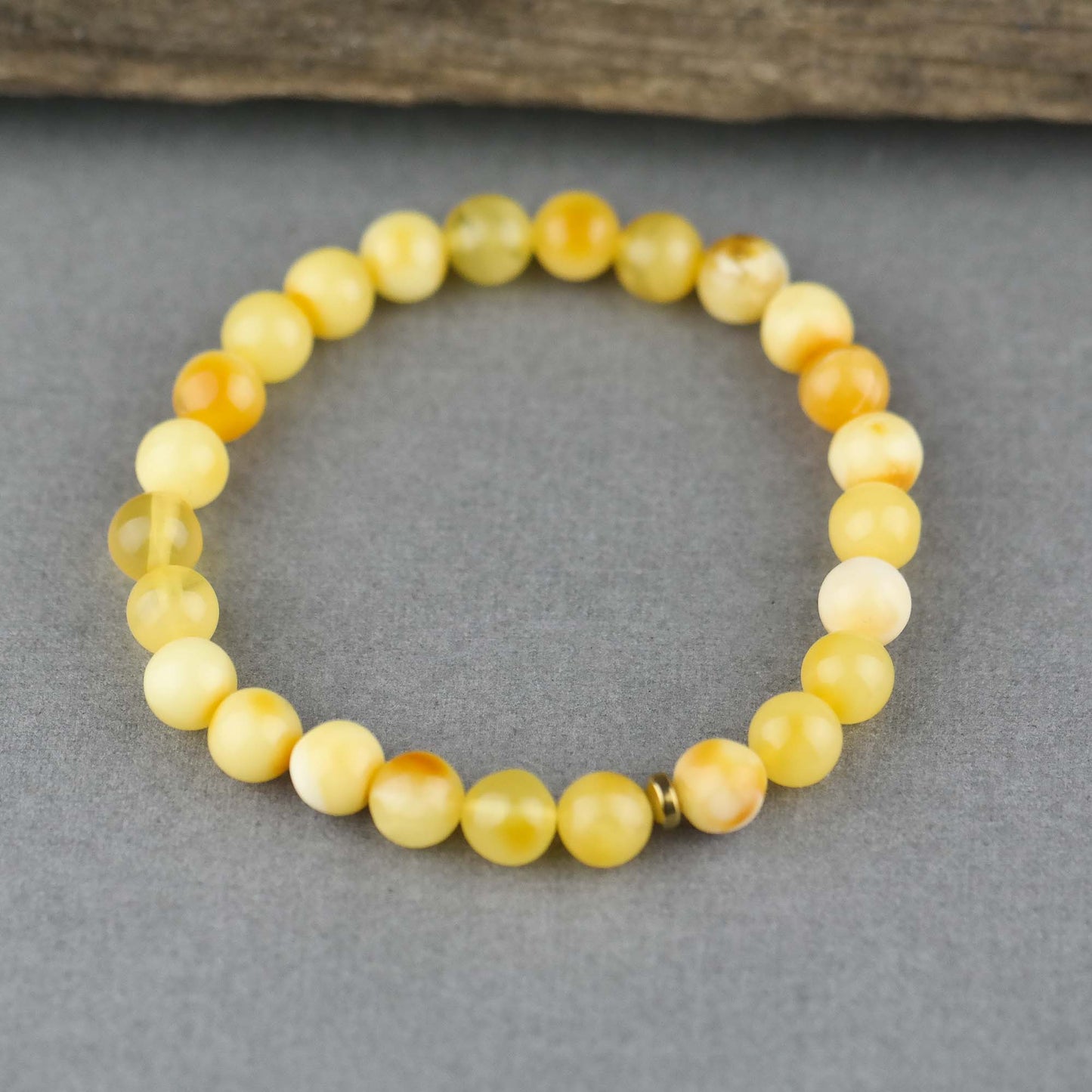 Handmade bracelets from round amber beads