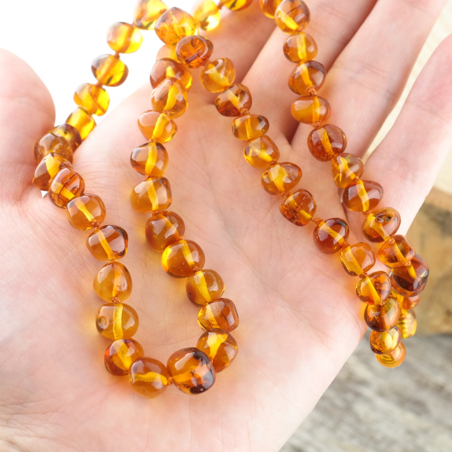 Unisex necklace from cognac amber beads