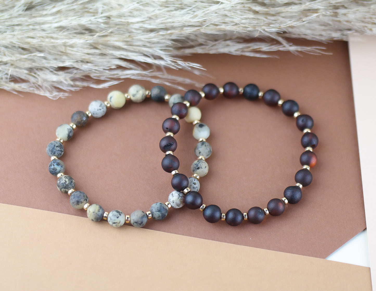 Handmade amber bracelet with gold colour hematite details