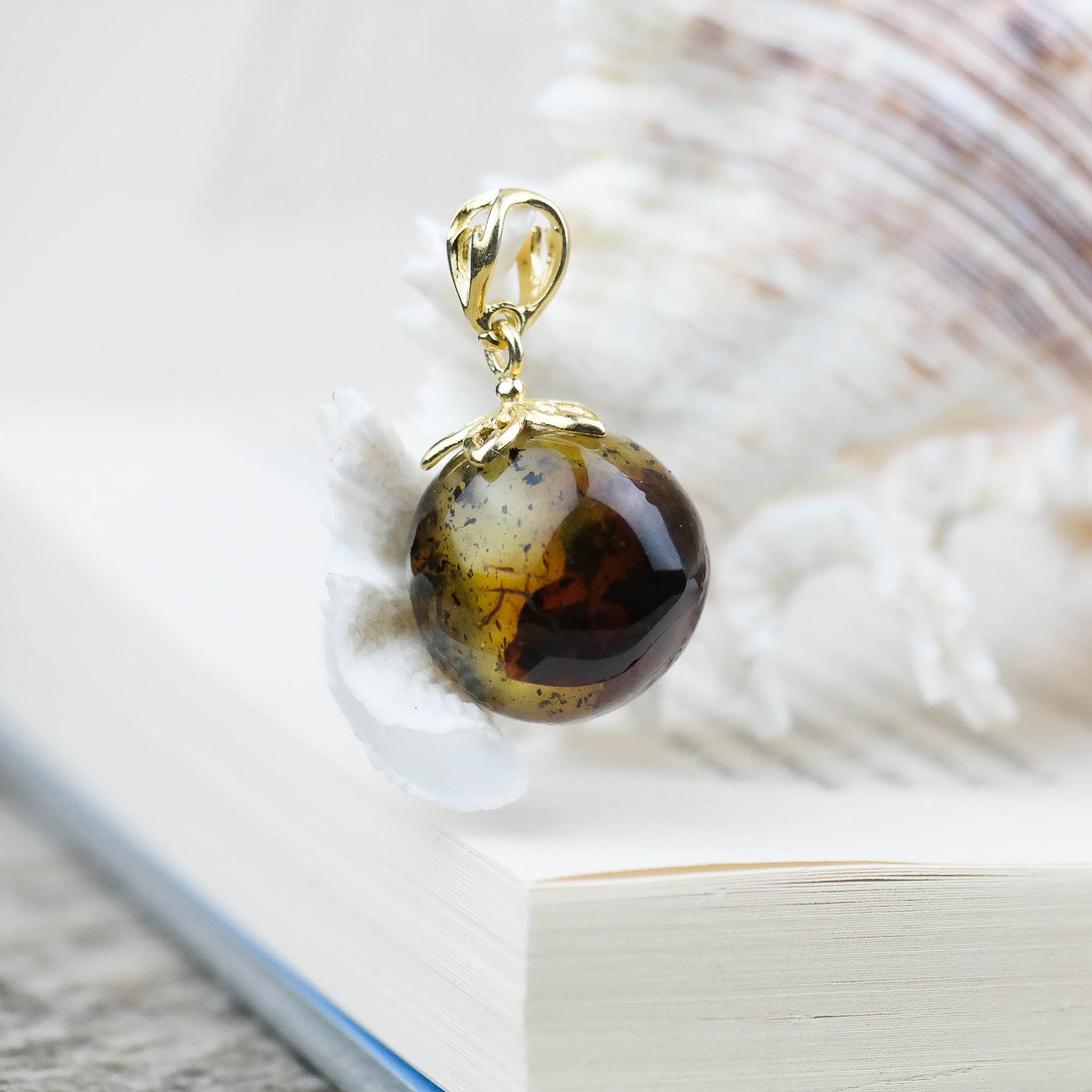 Gold plated natural Baltic amber pendant
