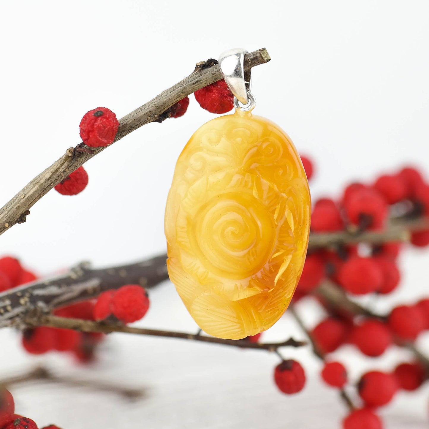 Natural amber hand carved rose pendant