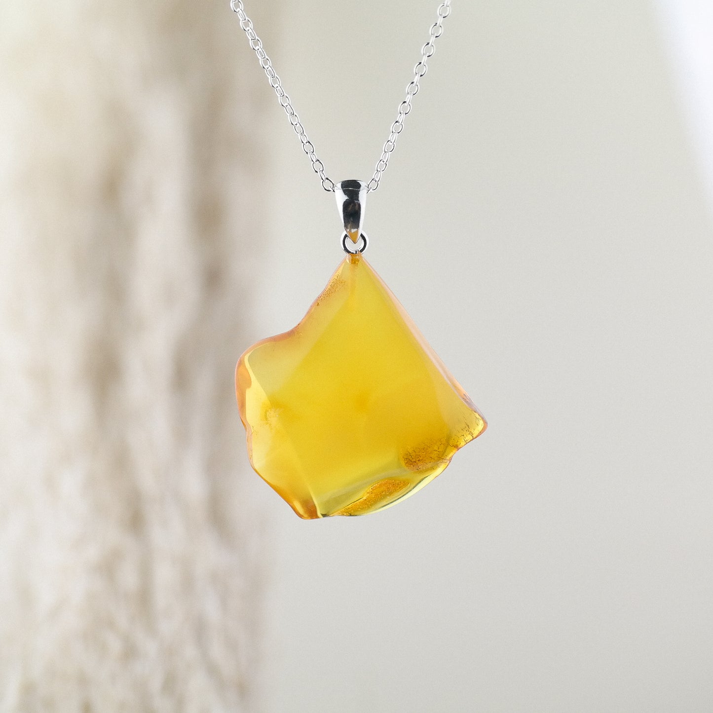 Natural amber caramel pendant