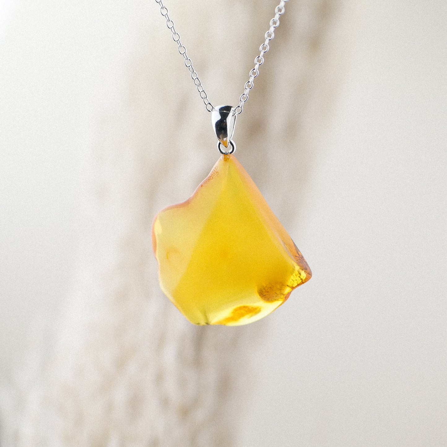 Natural amber caramel pendant