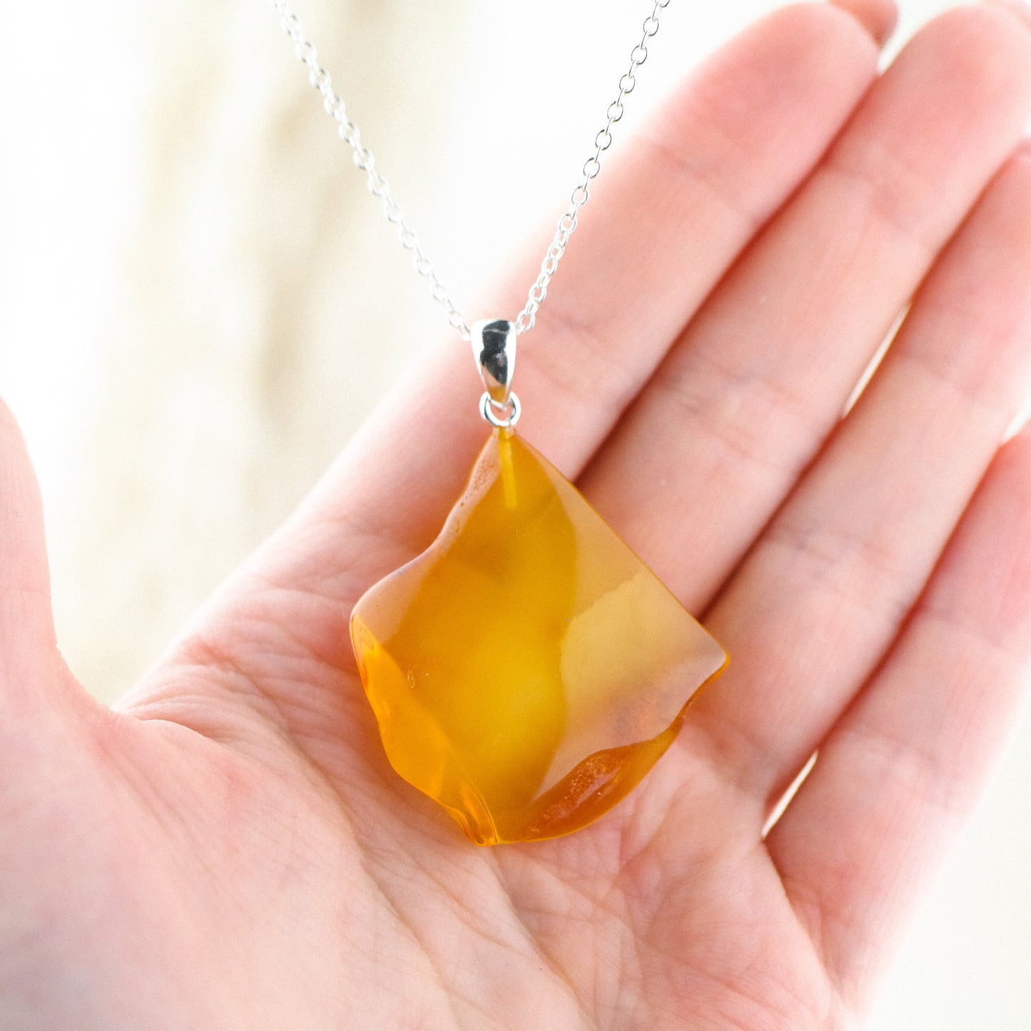 Natural amber caramel pendant