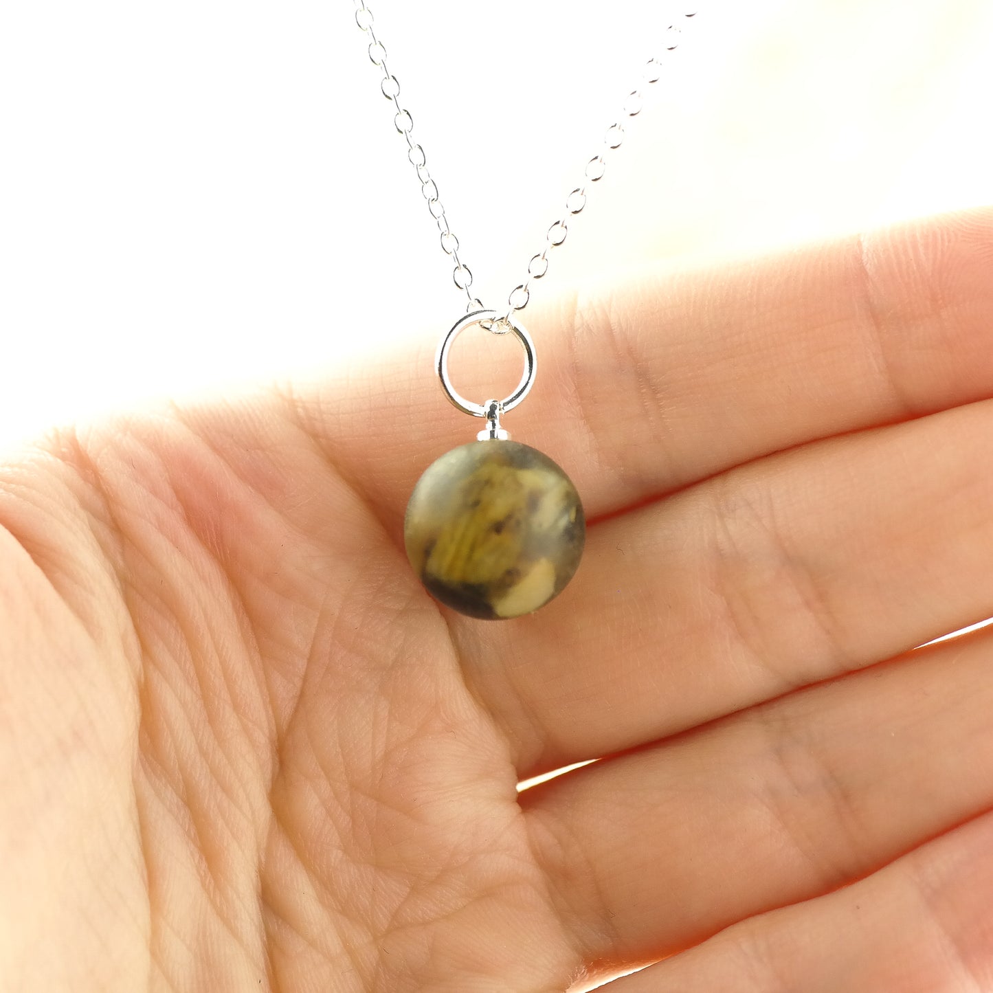 Little raw amber bead pendant