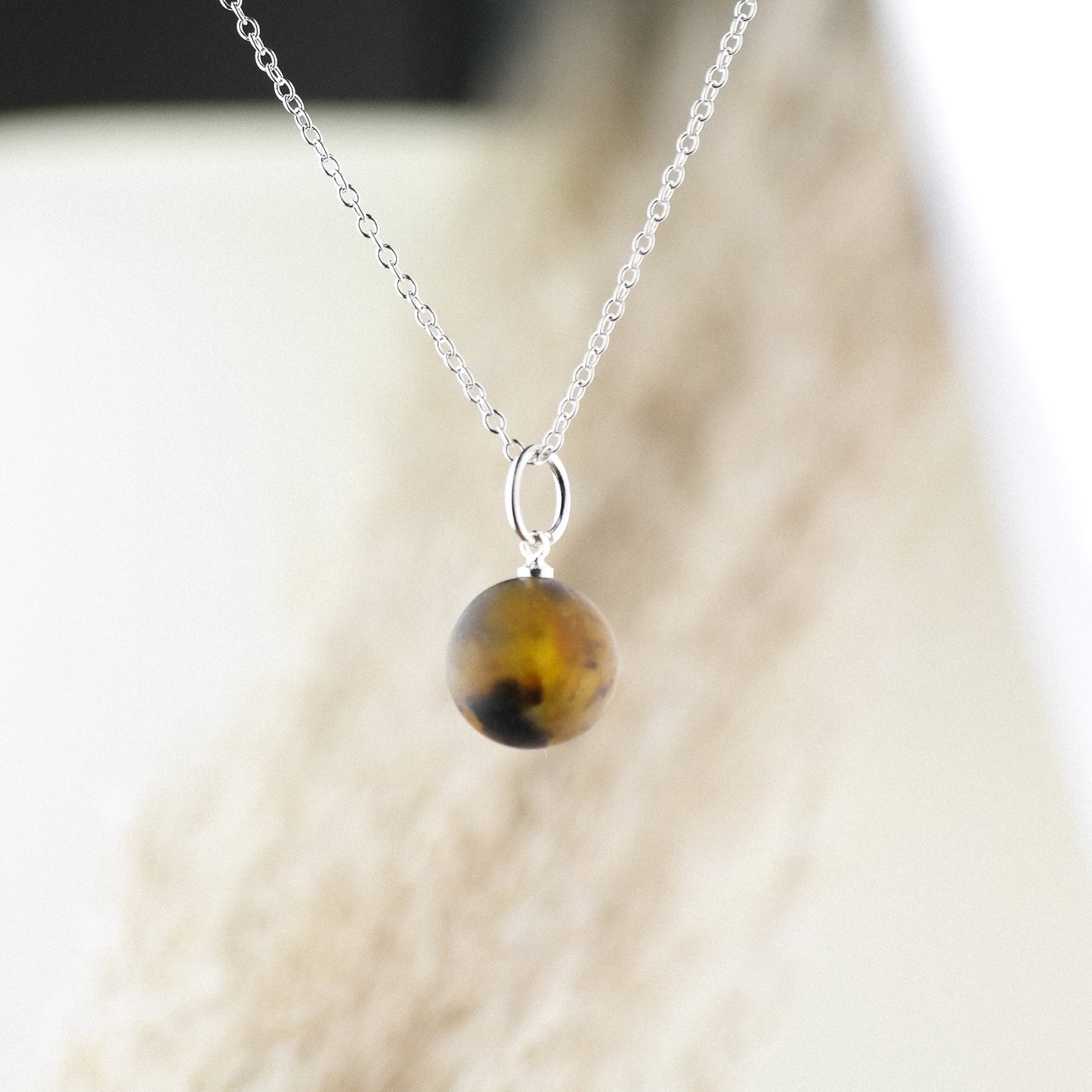 Little raw amber bead pendant