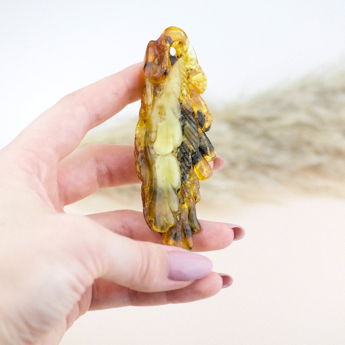 Amber angel wing pendant