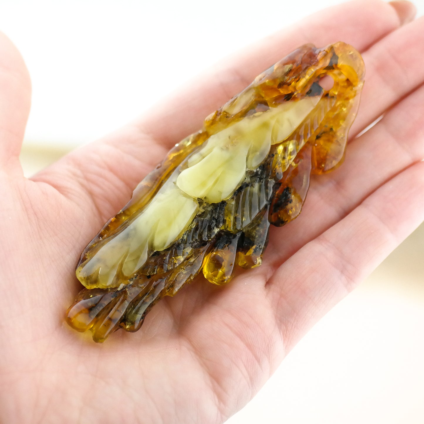 Amber angel wing pendant