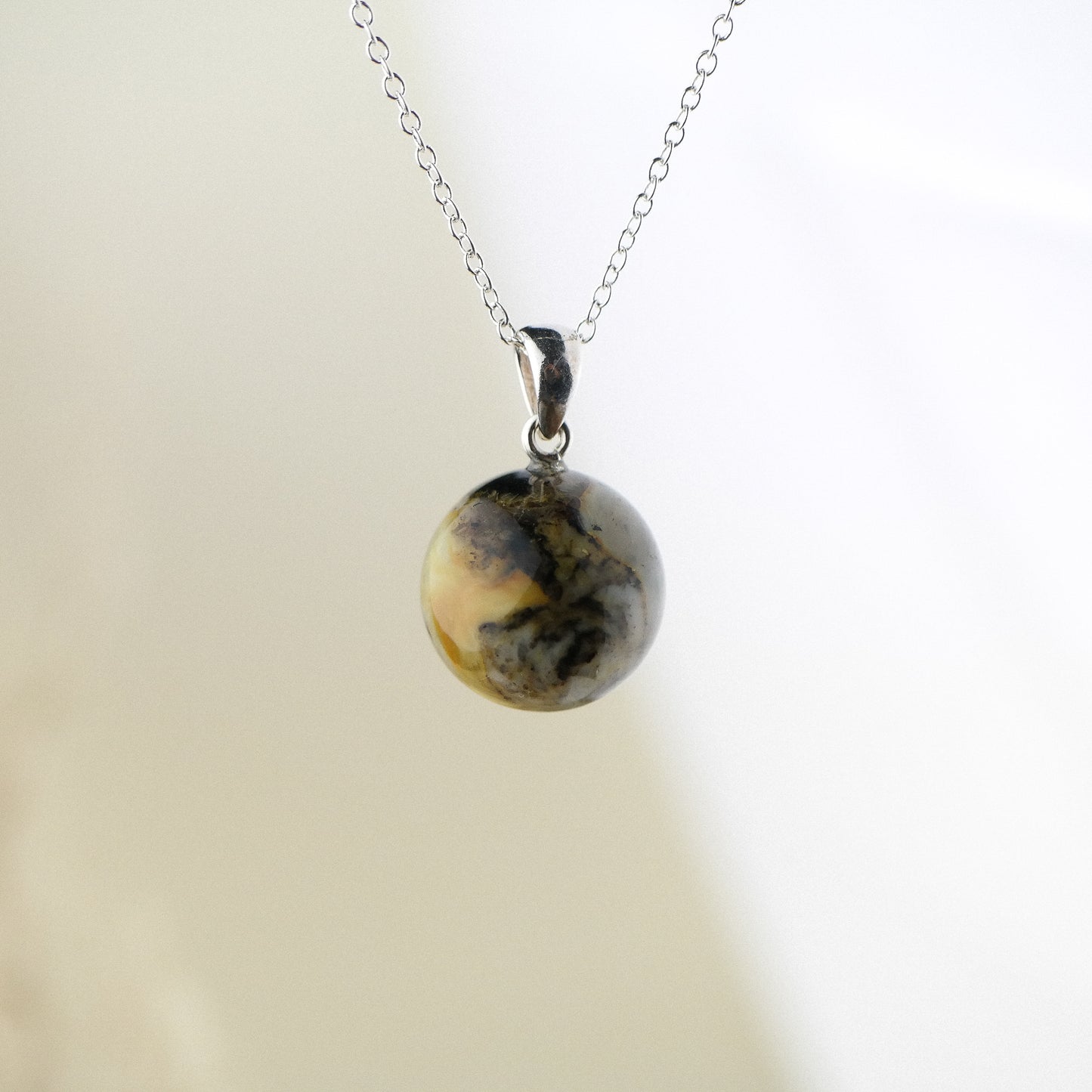 Minimalist natural Baltic amber pendant