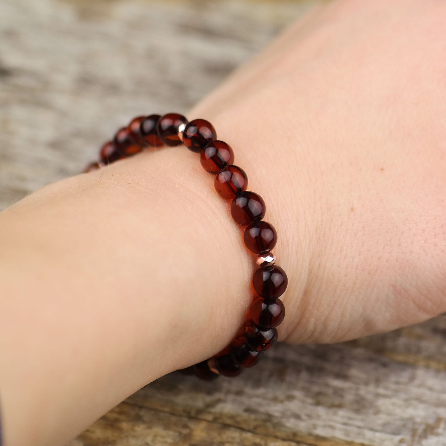 Chic natural Baltic amber bracelet with rose gold colour details