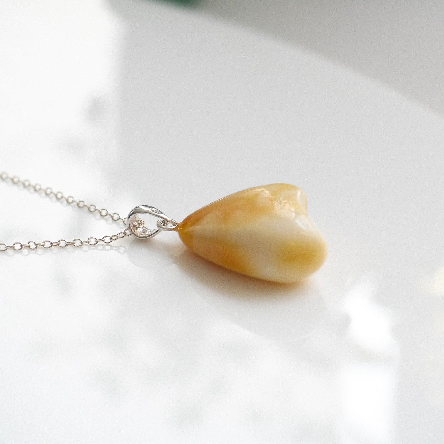 White amber pendant