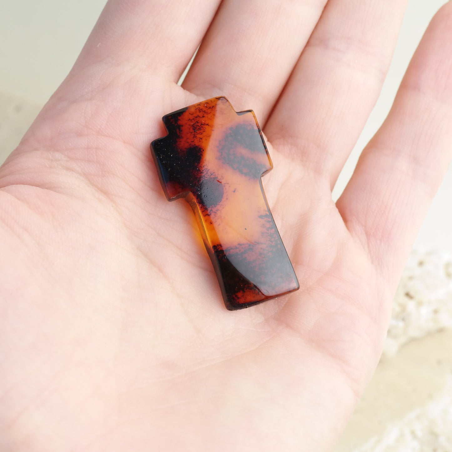 Hand carved crosses from natural Baltic amber