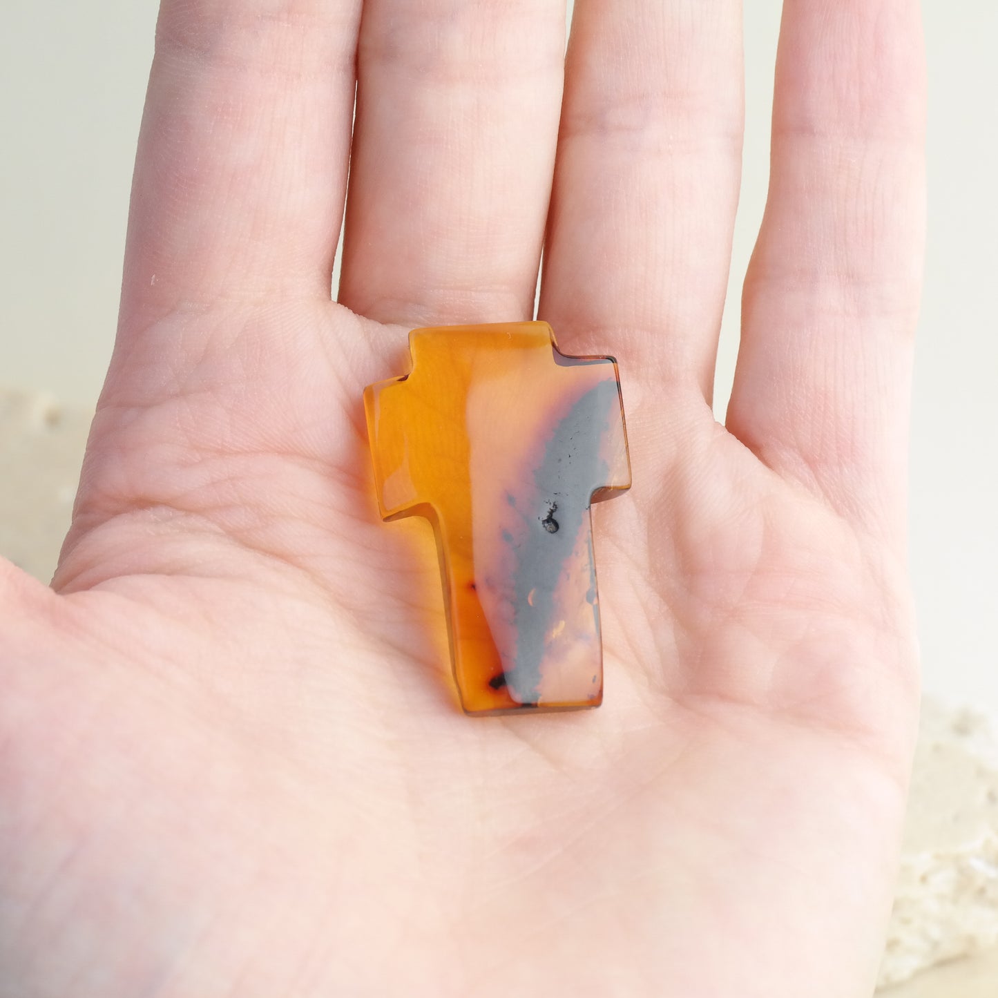 Hand carved crosses from natural Baltic amber