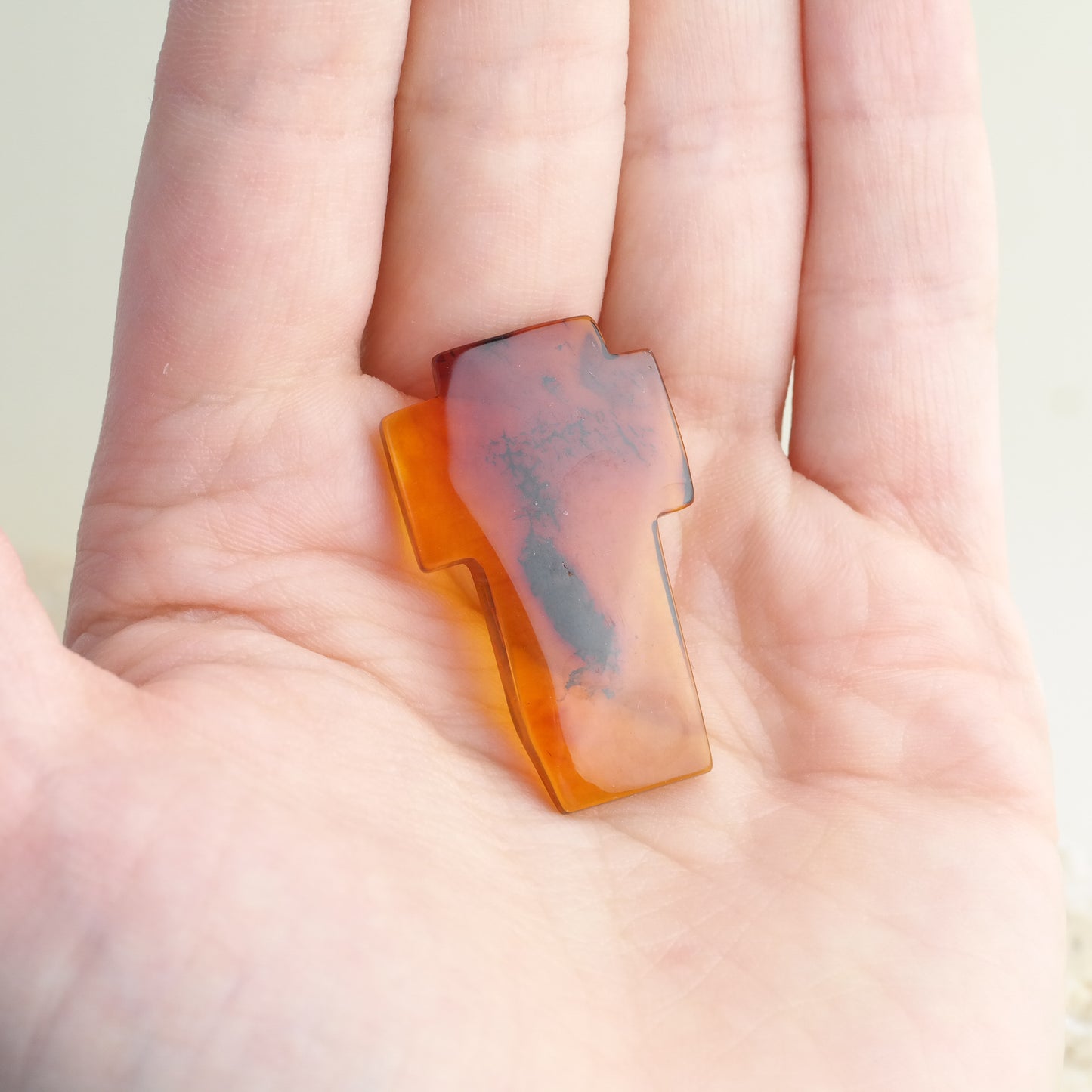 Hand carved crosses from natural Baltic amber