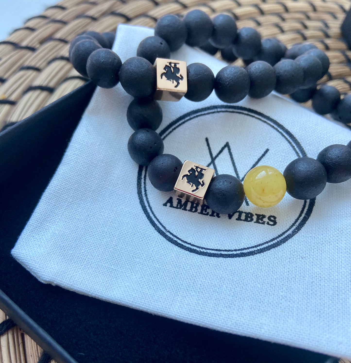 Amber bracelet with handmade brass bead of Vytis