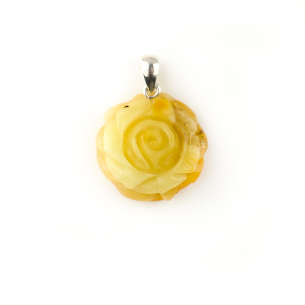 Hand carved rose pendant