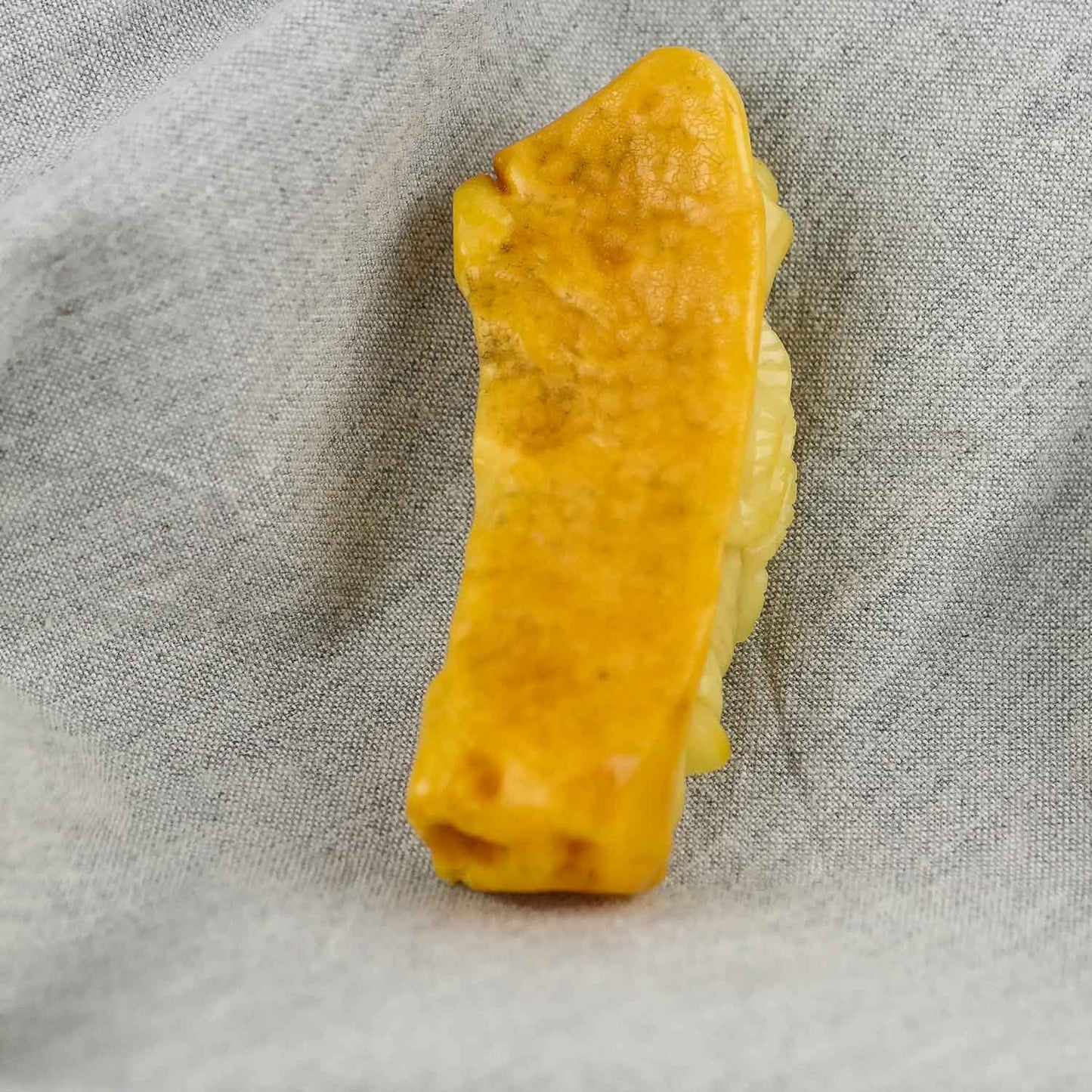 Hand carved amber buddha