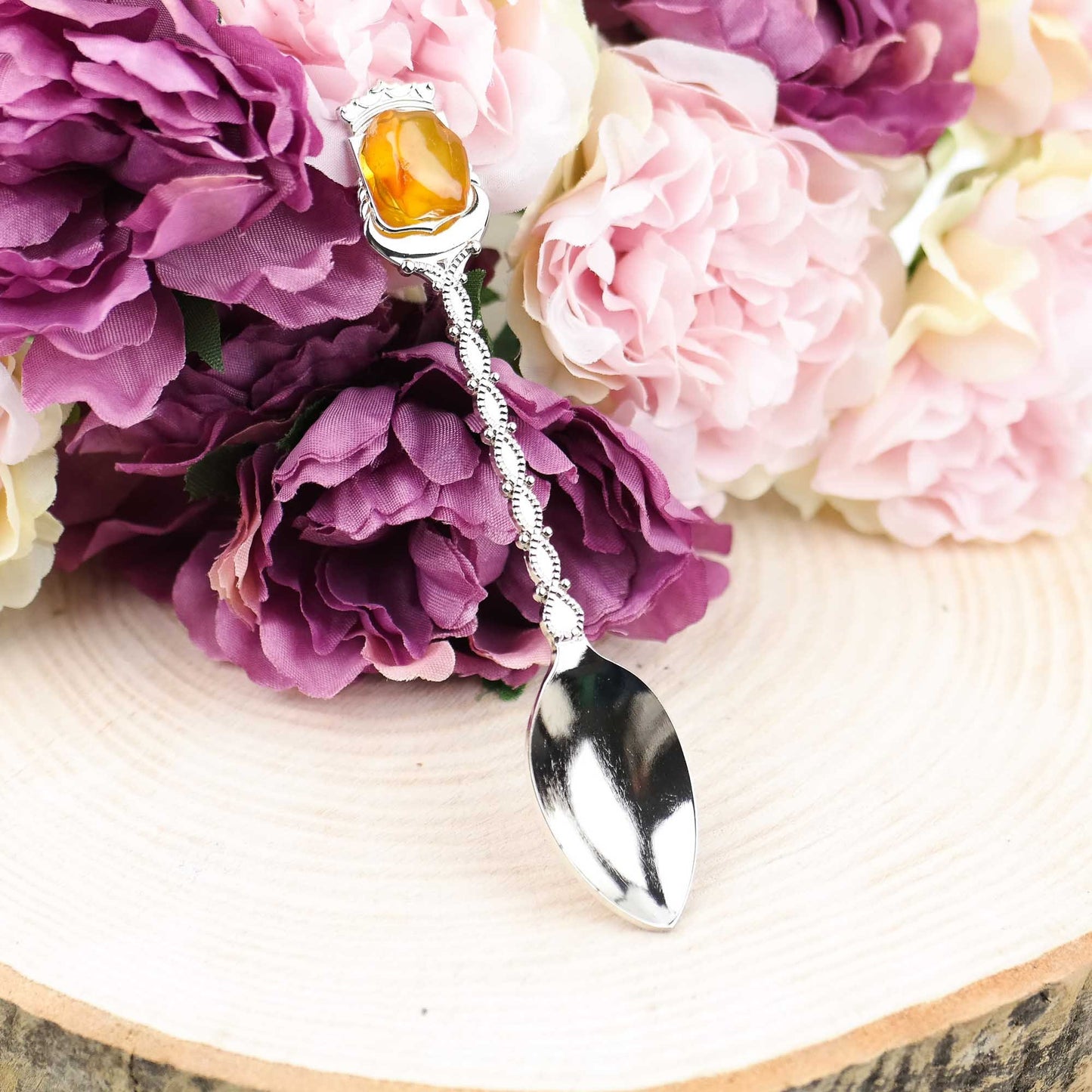 Tea spoon with natural Baltic amber stone
