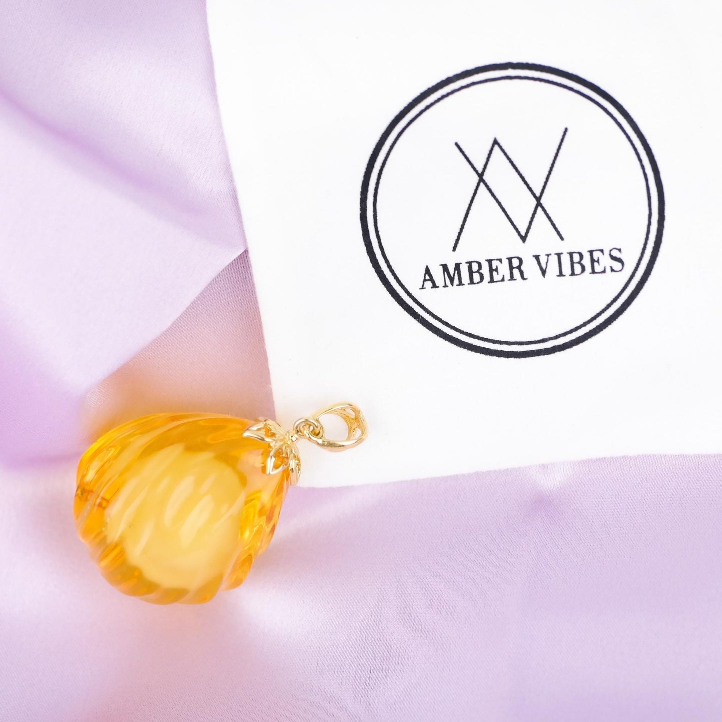 Stunning natural amber gold plated pendant