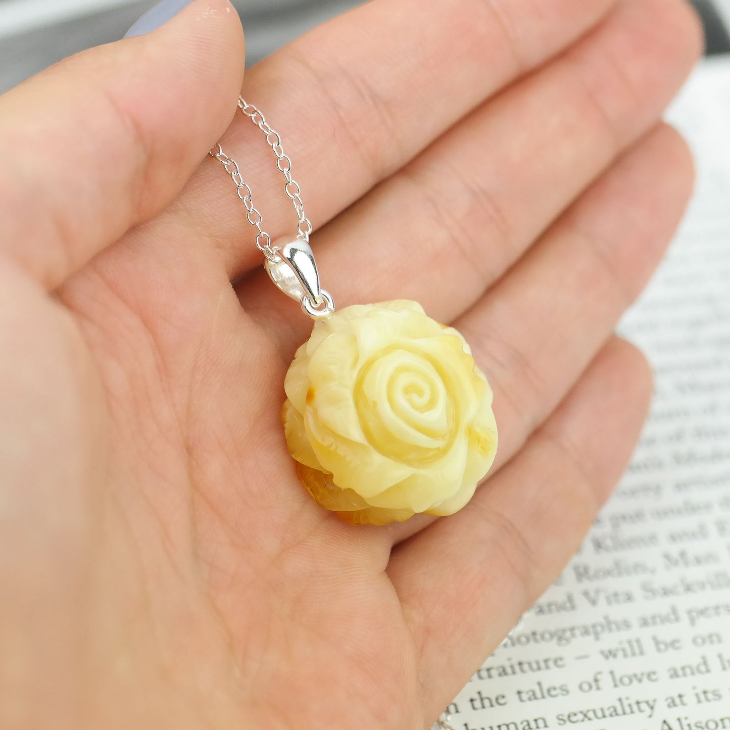 Natural amber hand carved pendants